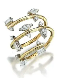 A gold and diamond ring with two rows of diamonds.