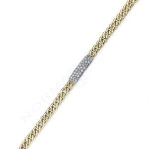 A gold chain with a diamond bar on it.